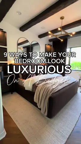 9 ways to make your bedroom look Luxurious on a budget.  🤎 Opt for a decorative headboard or a bed frame that makes a statement  🤎 Layer and Overfill your throw pillows. The fluffier the bedding the better. You want that hotel look  🤎 Add beautiful velvet drapes. This a great way to make a room look more luxurious. Make sure you curtains are hung properly.  🤎 Use lush layers  🤎 Add a large mirror or mirrors to your space  🤎 Add warm low level lighting  🤎 Stick with a neutral color theme  🤎 Add a hanging light fixture  🤎 Incorporate a rug  #cozyhome #aesthetichome #homestyling #homedecor #homedecortips #luxurybedroom #luxurydecoronabudget #bougieonabudget #cozybedroom 