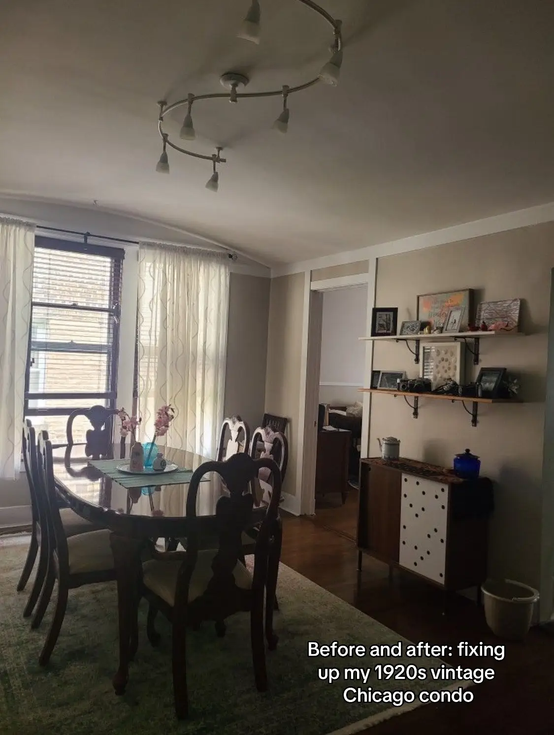 I live in a vintage Chicago condo, the kind with lots of exposed brick and dark wood trim. It has so much great character, but previous owners made some… interesting decisions. One of those was track lighting, which absolutely needed to go, but swapping out fixtures left holes and shadows that needed to be fixed — so I had a painter here this week! With every update I make, I’m mindful of honoring my home’s character, which generally means choosing vintage colors and decor. Anything from the art nouveau and deco of the 1920s up to the clean lines of mid-century modern works! #chicago #1920s #vintage #vintagecondo #vintageapartment #vintageaesthetic #vintagedecor #painting #lighting #chandelier  #chicagolife #remodel #remodeling me I’m  #homerenovation #homeremodel #homeremodeling  The rug isn’t fully rolled out in the bedroom pic because I need a second person to do it. My cousin is coming tomorrow to help. 