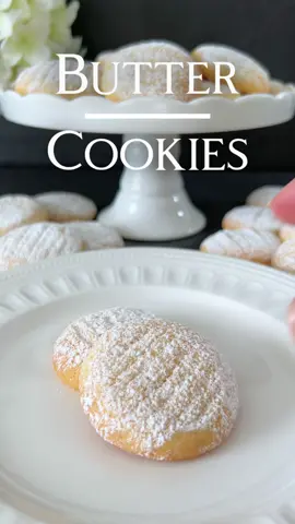 Butter Cookies Recipe 🤍 Its melt-in-your-mouth texture and irresistible flavor make these butter cookies a delightful treat 🥰 📝 Ingredients: - 200g all-purpose flour - 125g softened butter - 1 teaspoon baking powder - 1 teaspoon vanilla extract - 100g powdered sugar - A pinch of salt 🤍 Instructions: 1. Begin by preheating your oven to 180 degrees Celsius (350 degrees Fahrenheit) and line a baking sheet with parchment paper. 2. In a mixing bowl, cream together the softened butter, powdered sugar, and vanilla extract until smooth and creamy. 3. Add the flour, baking powder, and a pinch of salt to the mixture, and combine until a soft dough forms. 4. Wrap the dough in plastic wrap and refrigerate for about 30 minutes to allow it to firm up. 5. Once chilled, remove the dough from the refrigerator and shape it into small balls. 6. Place the dough balls on the prepared baking sheet, spacing them apart to allow for spreading during baking. 7. Gently flatten each dough ball with the palm of your hand to create a round cookie shape. 8. Bake in the preheated oven for approximately 12-15 minutes, or until the cookies are lightly golden around the edges. 9. Remove from the oven and allow the cookies to cool on the baking sheet for a few minutes before transferring them to a wire rack to cool completely. Enjoy these delicious butter cookies with your favorite hot beverage! 🤍
