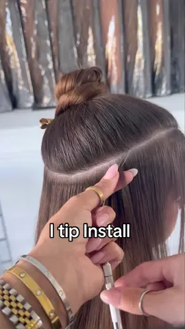 Installing the I-Tip Extensions 	1.	Take a Small Section of Hair: Using the sectioning comb, take a small U shaped section of the natural hair. The section should be no wider than when the bead is closed. 	2.	Thread the Hair Through the loop tool: Using the bead application tool, thread the small section of your natural hair through a copper flare bead. 	3.	Insert the I-Tip Extension: Place the i-tip extension into the cooper flare bead along with your natural hair. 	4.	Secure the Bead: Using the Bellami pro pliers, clamp down on the bead to secure it in place. Make sure the bead is flattened well to ensure a strong hold. 	5.	Repeat: Continue this process throughout the sections of your hair, ensuring even distribution and a natural look. For all enquires   💻 www.Luxxloxx.net 📧 hello@luxxloxx.net  𝐒𝐀𝐕𝐄 • 𝐒𝐇𝐀𝐑𝐄 • 𝐋𝐈𝐊𝐄 • 𝐂𝐎𝐌𝐌𝐄𝐍𝐓 𝐋𝐮𝐱𝐱𝐋𝐨𝐱𝐱 𝐇𝐚𝐢𝐫𝐬𝐭𝐲𝐥𝐢𝐧𝐠 𝐚𝐧𝐝 𝐄𝐝𝐮𝐜𝐚𝐭𝐢𝐨𝐧 𝐆𝐨𝐥𝐝 𝐂𝐨𝐚𝐬𝐭 - 𝐀𝐔𝐒𝐓𝐑𝐀𝐋𝐈𝐀 #bellami #bellamihair #bellamihairextensions #bellamihairpro #bellamihairtransformation #bellamihairproextensions #keratinbonds #bondextensions #sewinweftextensions #sewinwefts #sewinweft #keratin #beadedextentions #beadedhair #beadedhairextensions #weave #extensions #hairextensions #hairextensionspecialist #hairextensionsclipins #hairtok #hairtutorial #hairtutorials#m #hairtutorialsvideo #hairtututorial #hairextensiontutorial #hairvideo #itip #itiphairextensions #itipshairextensions #itipextensions #hairextensions #hairextensionspecialist #hairextensionseducation ##extensioninstalls #extensioninstall #individualhairextensions @Bellamihair 