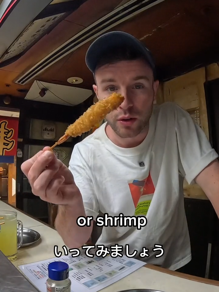 $2 kushikatsu in Japan 🇯🇵  #hughabroad #streetfood #travel #japanesefood