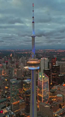 As night falls, the CN Tower illuminates Toronto’s evening skyline. #toronto  #cntower  #explore  #canada  #fyp 
