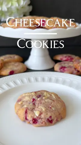 Cheesecake Cookies Recipe 🤍 These cheesecake cookies with fresh raspberries are a true delight. Fluffy, creamy, and fruity – perfect for any occasion! 🥰 📝 Ingredients: For the cookie dough: - 125 g butter, softened - 100 g sugar - 1 egg (size M) - 1 tsp vanilla extract - 190 g flour (Type 405) - 1/2 tsp baking powder - 1/4 tsp salt - 100 g fresh raspberries, chopped For the cheesecake filling: - 100 g cream cheese - 50 g sugar - 1/2 tsp vanilla extract - 1 tbsp cornstarch 🤍 Instructions: 1. Preheat the oven to 180°C (350°F) and line a baking sheet with parchment paper. 2. In a large bowl, cream together the butter and sugar until light and fluffy. Add the egg and vanilla extract, mixing well. Gradually add the flour, baking powder, and salt, stirring until a homogeneous dough forms. Gently fold in the chopped raspberries. 3. In a separate bowl, beat the cream cheese, sugar, vanilla extract, and cornstarch until smooth. 4. Scoop tablespoon-sized portions of the dough onto the prepared baking sheet. Make small indentations in the center of each dough ball with a damp finger or a spoon. Fill each indentation with about a teaspoon of the cheesecake mixture. 5. Top the filled cookies with small pieces of dough, covering the filling. Use a spoon to gently pull the dough from bottom to top, forming a ball. Sprinkle with white chocolate shavings. 6. Bake the cookies for 12-15 minutes until they are lightly golden brown.  7. Allow the cookies to cool on the baking sheet for a few minutes before transferring them to a wire rack to cool completely. Enjoy these delicious raspberry cheesecake cookies with a glass of milk or a cup of tea! 🤍