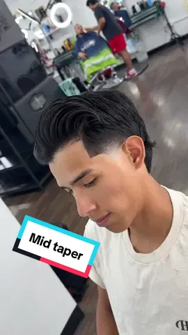Mid taper with a flo haircut on straight hair, this hair transformation is fun and recommended for someone that is looking for a longer hairstyle. #kansasbarber #wichitakansas #dallas #barberconsultation #blowouttaper #menshairstyle 