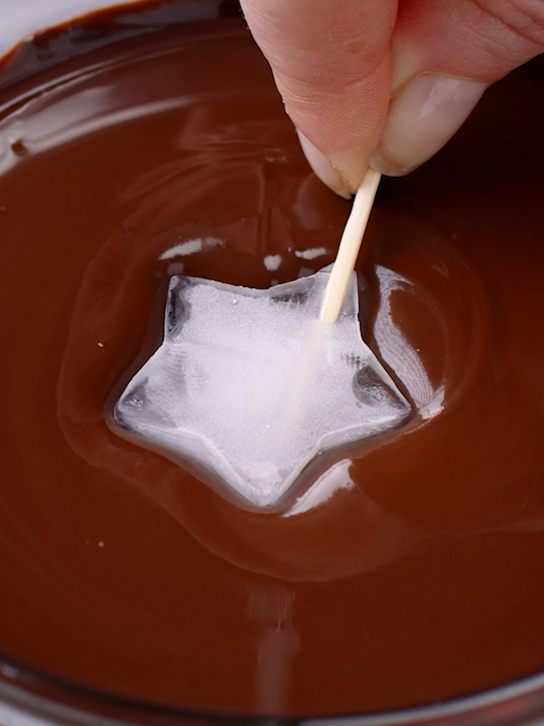 🧊🍫 Just dip the #ice into the #chocolate to make a delicious #treat in no-time 😍 This method is worth a try! 👉INGREDIENTS  180g melted chocolate  100g Greek yogurt  👉METHOD 1. Freeze stars from ice with toothpicks in it, dip them into the melted chocolate, and freeze again. 2. Scoop out the ice and fill the chocolate stars with Greek yogurt. 3. Freeze again, top with more chocolate, and freeze for the last time. What else could you serve these with? ⤵️ #cookistwow #cookistrecipe #recipes #desserts #decorations #foodlover #foodtok