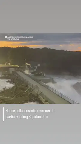 A house next to the partially failing Rapidan Dam collapsed into the Blue Earth River in Rapidan, Minnesota, on Tuesday, June 25, footage shows.  #minnesota #news #fyp