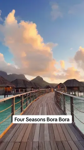 who would you bring here for sunset?  👀 This was a magical sunset at Four Seasons Resort Bora-Bora 🌸 the amazing thing about this place is that the water looks amazing any time of day. The shade of blue changes with the light and during sunset there is a golden sparkle that blankets the water 🥹  #fourseasonshotel #fourseasonsborabora #borabora #frenchpolynesia #luxuryhotel #sunset 