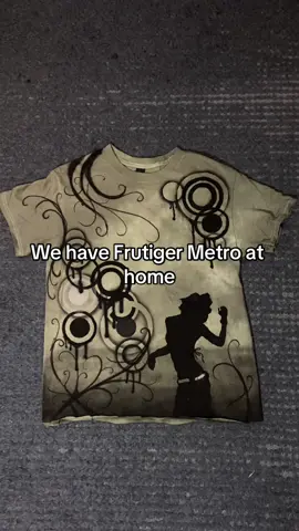 Airbrushing fruitger metro an old shirt #airbrush #frutigermetro #2010s #fyp 