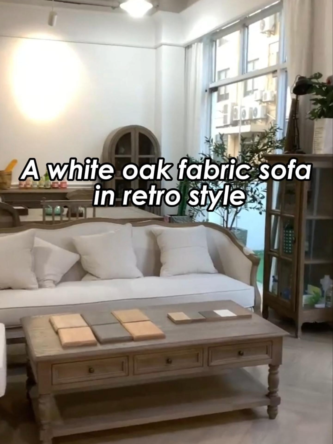 A white oak fabric sofa that complements retro-style decor perfectly. This classic and durable sofa looks amazing whether paired with retro or country-style decor. #furniture #solidwoodfurniture #livingroominspiration #livingroomsofa #retrostyle #sofa