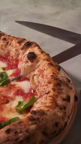 We made the best pizza in the world! 🍕 Pizza is, without a doubt, one of the best expressions of Italian cuisine. A few simple, good quality ingredients that can be transformed into something absolutely unreal with the right level of love and attention! ❤️ I had the opportunity to make and try the best pizza in the world, with the best pizza chef in the world Michele Pascarella! 🔥  And you know what's the best part? We've also got a recipe for you to give it a go. 👇  Biga process and recipe 🍕❤️ Ingredients for STAGE 1️⃣:  • 1kg strong flour (we used MIDI 002 from @molinodenti) • 13.5%/14% protein content • 500ml water • 7g fresh yeast or 5g dried active yeast Ingredients for STAGE 2️⃣:  • All the biga (cut into a few small pieces) • 250ml chilled water • 25/30g sea salt • 2g fresh yeast • 10g malt, either diastatic or not STAGE 1️⃣:  Dissolve the yeast into the water and start to mix the 3 elements roughly. It’s very important to incorporate the ingredients together until you reach a rough consistency. Do not overmix the biga, mix it until all the flour is incorporated but does not create the gluten structure. Let it ferment in a sealed plastic container for about 18/20 hours at room temperature.  20 hours later, get ready for the Stage 2.  STAGE 2️⃣:  Into a dough mixer, place the biga first followed by the yeast and 40% of the water.  When the dough comes together add the malt and more of the remaining water little by little. Keep the dough hydrated by adding constantly a drizzle of water. When you have about 30% of the original water left add the salt first and finish with the remaining water added little by little. Once all the water has been incorporated switch off the mixer, place the dough on a clean surface and rest it for 10 minutes. After 10 minutes give the dough a series of folding. This is required especially if your dough looks a bit too loose. After another 10/15 minutes of resting time divide the dough into 260g pizza balls. Place them in a plastic container and store them in the fridge at 4c degrees. Use it after 6 hours.  The shelf life of this dough is around 24 hours.  If you are going to make it don’t forget to tag us on the final result! ❤️🍕 #pizza  #bestpizza  #margherita  #italianfood  #recipeshare  #cheflife  #ciboitaliano  #cheese #pizza #italiancuisine #sharingiscaring 
