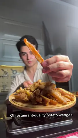 Better than french fries! Crispy Potato Wedges 😍  Instagram: @m1danial Youtube: m1danial #frenchfries #Recipe #potato #wedges #recipes #recipesoftiktok #foodtiktok #food #cooking #desi #pakistan #india #snacks #crispy #chef #homemade #trending #viral #fyp #fypシ #fypシ゚viral #explore #explorepage 