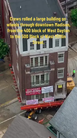 INCREDIBLE CONSTRUCTION HISTORY!🙏🙏 MADISON, Wis.- When you think of someone moving apartments, you imagine them moving people and belongings to a new building -- not literally moving the apartment building itself to a new location.  Crews rolled a large building on wheels through downtown Madison, from the 400 block of West Dayton to the 500 Block of West Mifflin Street. The apartment building was supposed to make a 1-day, 1-block journey Thursday. However, according to the owner and City of Madison Building Inspection officials, MG&E had to restore power for residents in the area Thursday night. But residents didn't seem to mind the two-day spectacle. 