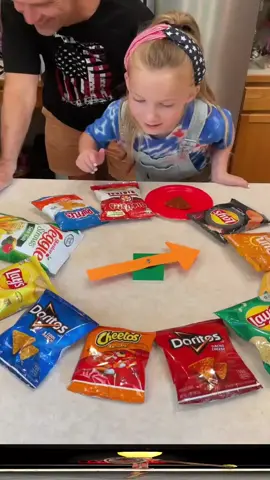 I'm Betting All My Chips on this Game 😂 Kids, dad, and family play spinner table game at home on kitchen table with mini chip bags like doritos, cheetos, lays, and spicy chip for money prizes. Funny game for cookouts, parties, and family gatherings. (for entertainment purposes only)