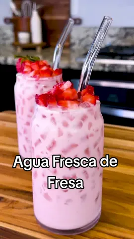 Agua Fresca de Fresa Cremosita 🥰 Let me share with you guys how easy it is to make this Agua Fresca de Fresa Cremosita, a Creamy Strawberry Drink. It's so refreshingly good! Make sure to use bright red strawberries for more flavor. AGUA FRESCA DE FRESA INGREDIENTS: ► 2 lbs. strawberries ► 4 cups of water ► 1 tbsp vanilla extract ► 1 can of evaporated milk ► 1 cup of whole milk ► 1 can of sweetened condensed milk ► Some extra strawberries for garnish (optional) #foryoupage #foryou #parati #aguafresca #aguasfrescas #recetasfaciles #recetas #Recipe #aguadefresa #fresa #strawberry 