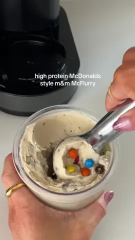 High protein m&m McFlurry🍦this is the only way you to eat your protein shakes from now on 344 calories and 32g protein for the whole tub!  Ingredients: 1 cup hilo milk 30g vanilla protein powder 1/4 cup yoghurt (50g) 1 tsp stevia, optional 1 tbs vanilla pudding mix  15g mini m&ms 2 spins in the ninja creami on lite ice cream mode then set to mix in  #ninjacreami #proteinshake #mcflurry 