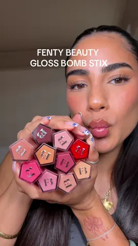 FENTY BEAUTY GLOSS BOMB STIX SWATCHES ahhhh. Whats your fave? I paired some of these with another launch coming soon 👀✏️ - blaz’d donut  - two’lip kiss  - fenty glow  - is it fussy  - high’biscus - riri - sorta selfish  - sp’ice cold - hot chocolit  - the mvp  #fentybeauty #rihanna #glossbombstix @Fenty Beauty 