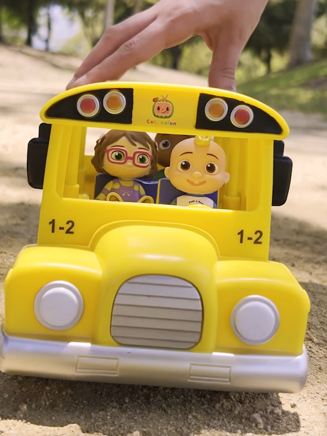 Hop on and sing along! The wheels on the bus go round and round! 🚌 #toys#cocomelon #wheelsonthebus #kidsoftiktok #nurseryrhyme