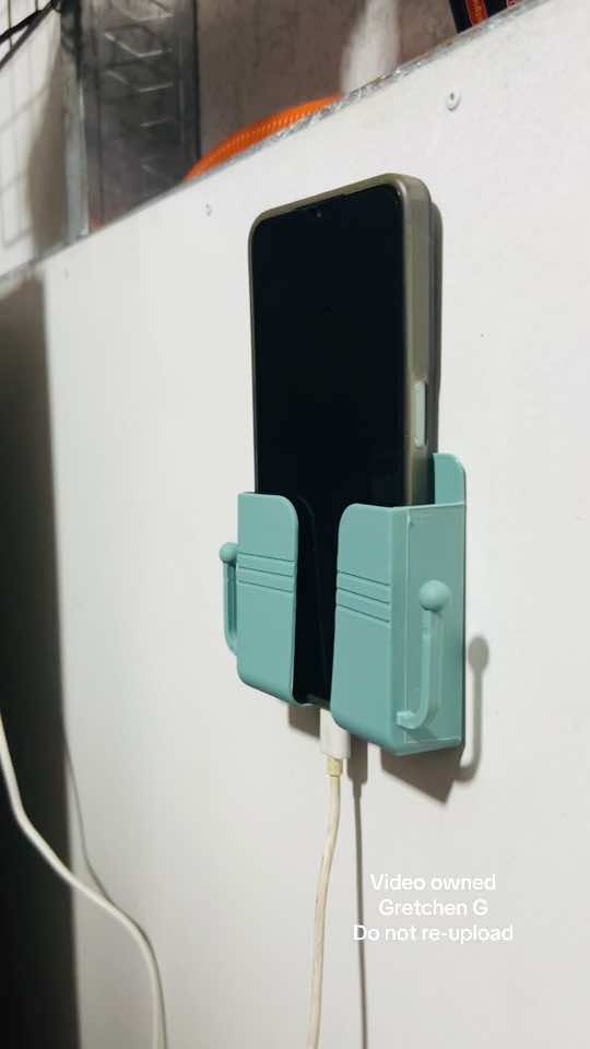 Wall mounted charging phone holder 