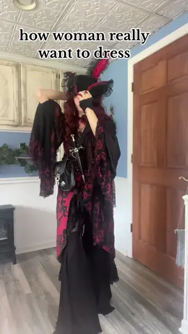Red vest: @damselcorsets  Black sleeve: Jagger and Stone Red and Black Lace Sleeves: Widow Black pants: widow Black lace duster: widow Hat: disney world Belt and Sheath: renn faire