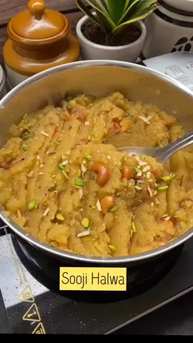 Sooji Halwa Step-by-step recipe: Heat a pan and add some ghee to it. Add cashew nuts, chopped almonds and pistachios. Fry for few seconds. Add resins to it and fry them together for few seconds. Remove and keep aside. Add 1/2 cup ghee to the same pan. When ghee melts add 1/2 cup semolina to it.Roast the semolina until it gets golden brown in colour and fragrant. Stir it continuously. Pour 1½ cup water gently. Stir constantly to avoid forming lumps. Cover it and cook for 1 minute until the water is absorbed completely to make halwa smooth. Add 1/2 cup sugar. Stir for 2 minutes, until the Sugar dissolves and leaves the sides of the pan. Add saffron dissolved milk (Soak the saffron in about 1 tbsp warm milk for 10- 15 minutes) ,1/2 tsp crushed cardamom, roasted dry fruits and mix them.Keep stirring and cooking till you get the final texture. Garnish with more chopped dry fruit Serve hot or warm.