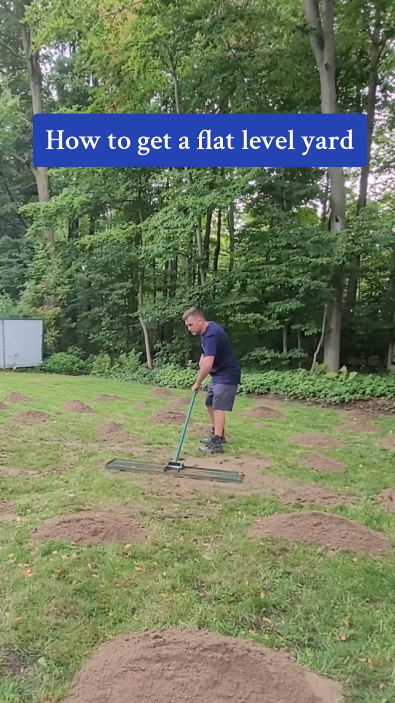 Secret to get a flat level yard, use SAND this will fill in all the slow spots, it compacts well and dosent wash away. Then you can add top soil and grass seed and this will give you a nice flat level yard. I like to use a yard leveling rake and roller these make the job easier. All the yard tools in this video are from @land.zie I have a code ben10 which saves you 10%  #yardmaintenance #yardwork #yardtips #yardtools #lawncare #lawntip #lawnmaintenance #lawnleveling #growinggrass #grassseed #grassseason #diyhomeimprovement #diylawncare #diylawn #diylandscaping #homeprojects #homerenos #homeownership #diyhomeprojects #diyprojectideas #handymanservice #bluecollarlife 