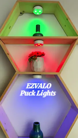 Illuminate your space with the versatile EZVALO Puck Lights! 🌈✨ These 14 color-changeable RGB LED lights are perfect for under cabinet lighting, closets, or any spot that needs a touch of brightness. With a 1200mAh rechargeable battery and easy tap or remote control, adding ambiance to your home has never been easier. Stick on and shine on! #EZVALO #HomeLighting #SmartHome #LEDLights #UnderCabinetLighting #InteriorDesign #easyupgrade 