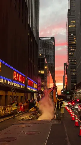 This might be one of the most cinematic moments l've experienced in New York City so far! 📽️✨ Seeing these construction workers repairing a steam system next to the iconic Radio City Music Hall is such a beautiful and peaceful moment.  captured on iPhone 13 Pro 4k at 30fps summer in new york #newyork #nyc #newyorkcity #cinemasb