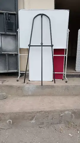 A metallic easel stand carrying up to 4ft*3ft heavy duty whiteboard,to place order 🤙📥 0.7.2.5.7.9.9.4.5.5#Easelstand #whiteboard #poartablewhiteboard #graphboards #tabletop #noticeboard #mobilewhiteboard 