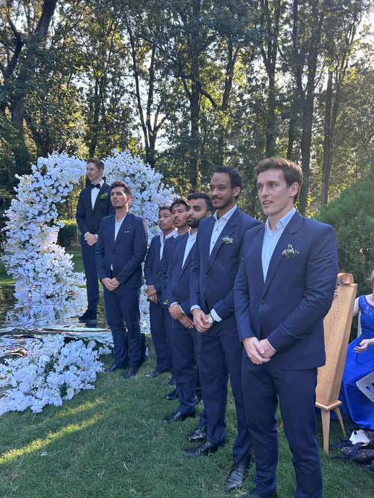 Replying to @diana_obed  Here is what our groomsmen wore and a full lineup of them with the bridesmaids. Outr theme was BOLD BRIGHT colors however we didnt want to go crazy with the groomsmen suits so we went for navy blue and it came together just perfectly for us, we loved it. #groomsmen#whatourgroomsmenwore #groomsmenoutfits #boldbrightcolorswedding #mismatchedbridesmaids #weddingtrends2024 #weddinginspo #bridesmaidsdresses #interracialcouple #weddingtalk #groomsmensquad 