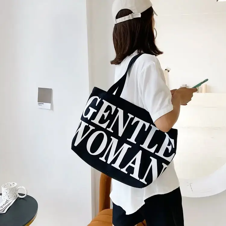 Tote bag women 2023 summer new fashion Korean edition simple canvas shoulder bag large capacity Tote letter big cloth bag copy link on first comment to order 