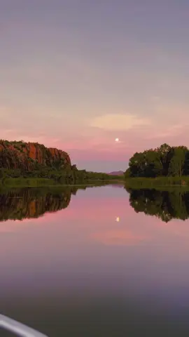 Mirror, mirror on the wall…we reckon the Kimberley is the fairest of them all 🪞😉 Dreamy landscapes fit for a fairytale, glassy waters, and an abundance of wildlife, a cruise through this stunning region is pure magic 🛥️✨  🎥: IG/righto.lets.go  📍: #Kununurra, #TheKimberley, @Australia's North West, @Western Australia  #SeeAustralia #ComeAndSayGday #WATheDreamState #AustraliasNorthWest  ID: A montage of scenes show the view from a slowly moving boat over glassy waters perfectly reflecting a pink sky and full moon on a waterway surrounded by green trees and orange cliffs.