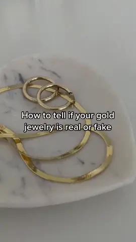 HOW TO: tell if your gold jewelry is real or fake⚡️ ✨ real gold will always sink in water ✨ it wont tarnish when getting wet ✨ it will be stamped with a number ✨ it won’t attach to a magnet Follow us for more tips and trick #solidgoldjewelry #solidgold #goldjewelry 