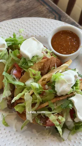 Restaurant Level 🌮 Hard Shell Tacos  - 1.5lbs Ranchera or Diesmillo   - 1/2 tbsp garlic powder  - 1 tsp pepper  - 2 tsp salt   - 1 tbsp neutral oil  - 1/2 an onion sliced - 1/4 c cilantro chopped  - 1 tsp cumin  - juice of a lime - Tortillas  Toppings:  - Monterey Jack  - Sour cream  - Lettuce  - Tomatoes  - Onions - Cilantro  Directions:  1. Add your meat to a large bowl along with the garlic powder, pepper, salt, oil, lime juice, cumin, cilantro, and onions.  2. Let it marinade for at least an hour.  3. Right before your meat is ready start prepping your taco shells.  4. You’re going to shallow fry them in a large skillet over medium heat.  5. Drop the tortilla in and use tongs to fold it into the taco shell shape. Hold one side up & the other in the oil for 10-15 seconds.  6. Now flip it over and do the same for the other side. Once it’s holding it’s shape you can use the tongs to open them up wider. 7. Now just cook till both sides are golden brown. About 1-2 mins total.  Make sure the oil is also getting into the inside so it cooks evenly.  8. Remove onto paper towel lined plate.  9. Prep your toppings: chop some lettuce, tomatoes, onions, and cilantro.  10. Now cook your meat in a cast iron over med heat for 2 mins per side.  11. Then dice it up.  12. Fill your tacos w your meat. Top with desired toppings. Serve & enjoy babe!  #tacotuesday #hardshelltaco #mexicanrecipes 