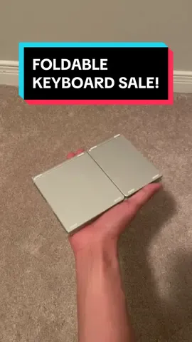 Under $20 for a limited time! This ultra compact foldable keyboard can be used with your phone, tablet, tv and many more. #foldablekeyboard #foldingkeyboard #minikeyboard #ipadkeyboard #tabletkeyboard #coolthingies 
