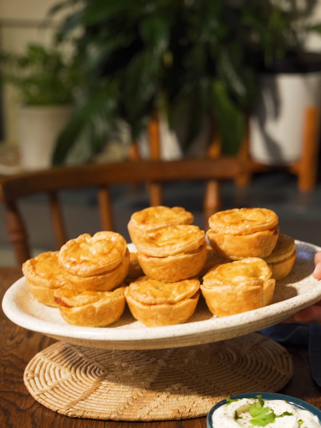 Mara this generation is lucky!🫵🏽 One tap while sitting at home craving and you get all the ingredients you need fast fast. No wonder this Butter Chicken Mini Pie recipe will be easy. 🥧⁣⁣ ⁣#ButterChickenMiniPies #MrDButterchickenminipies #comfortfood #baked #foodiesofsa #justmrdit #effortlessconvenience  Makes: 12⁣ Hands-on time: 20 minutes⁣ Hands-off time: 50 minutes⁣ ⁣ INGREDIENTS⁣ ⁣ 1 bag (600g) PnP Butter Chicken Soup ⁣ 1 cup rotisserie chicken, picked ⁣ 2 rolls (400g each) PnP Puff Pastry, defrosted⁣ 1 egg, beaten ⁣ ⁣ ⁣ Serving suggestion:⁣ Yoghurt and fresh coriander⁣ ⁣ ⁣ METHOD⁣ ⁣ 1. Preheat the oven to 180°C and spray a 12-cup muffin tin with cooking spray. ⁣ 2. Place the PnP Butter Chicken Soup in a medium pot over medium-high heat. Simmer until the soup thickens, about 10-15 minutes. ⁣ 3. Stir in the cooked chicken and cook for an additional 5 minutes. Remove from the heat and allow to cool.⁣ 4. On a floured work surface, roll out the puff pastry. Cut out circles that will fit inside the cups, ensuring they slightly overlap the edges.⁣ 5. Additionally, cut out 12 smaller circles to serve as lids. Place the larger pastry circles into each cup.⁣ 6. Fill each cup just below the rim with the cooled filling. ⁣ 7. Moisten the edges of the pastry cups with a bit of water, then place the smaller pastry circles on top, sealing the edges with a fork. Freeze the pies for an easy meal prep option! ⁣ 8. Brush the tops with the remaining egg yolk and pierce a small hole in the centre of each pie to allow the steam to escape. ⁣ 9. Bake for 30 minutes until golden brown. Remove from the oven and cool on a wire rack.⁣ 10. Serve with yoghurt and fresh coriander and ENJOY! ⁣