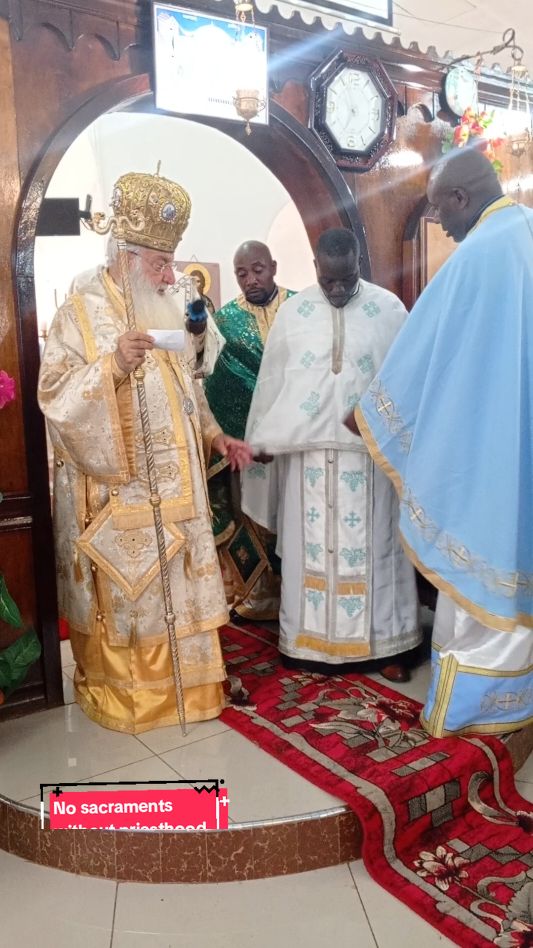 Vesting of a newly ordained priest.  ordination Is one of the seven sacraments of the church 