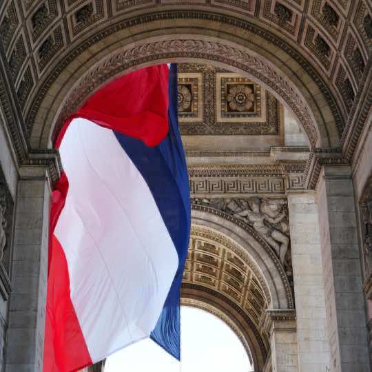 Under the grandeur of the Arc de Triomphe, the French flag flows gracefully in the wind, representing the freedom and unity that define this remarkable nation 🇫🇷 • • • • • #paris #2024olympics #parisolympics #parisolympics2024 #parisianstyle #parisfrance #louvre #monalisa #notredame #eiffeltower #seine #sacrecoeur #montmartre #arcdetriomphe #parisoutfits #🇫🇷 #champselysees #travel #traveltiktok #traveltok #travelbucketlist #luxury #luxurylife #luxurylifestyle #luxurytravel #luxuryliving