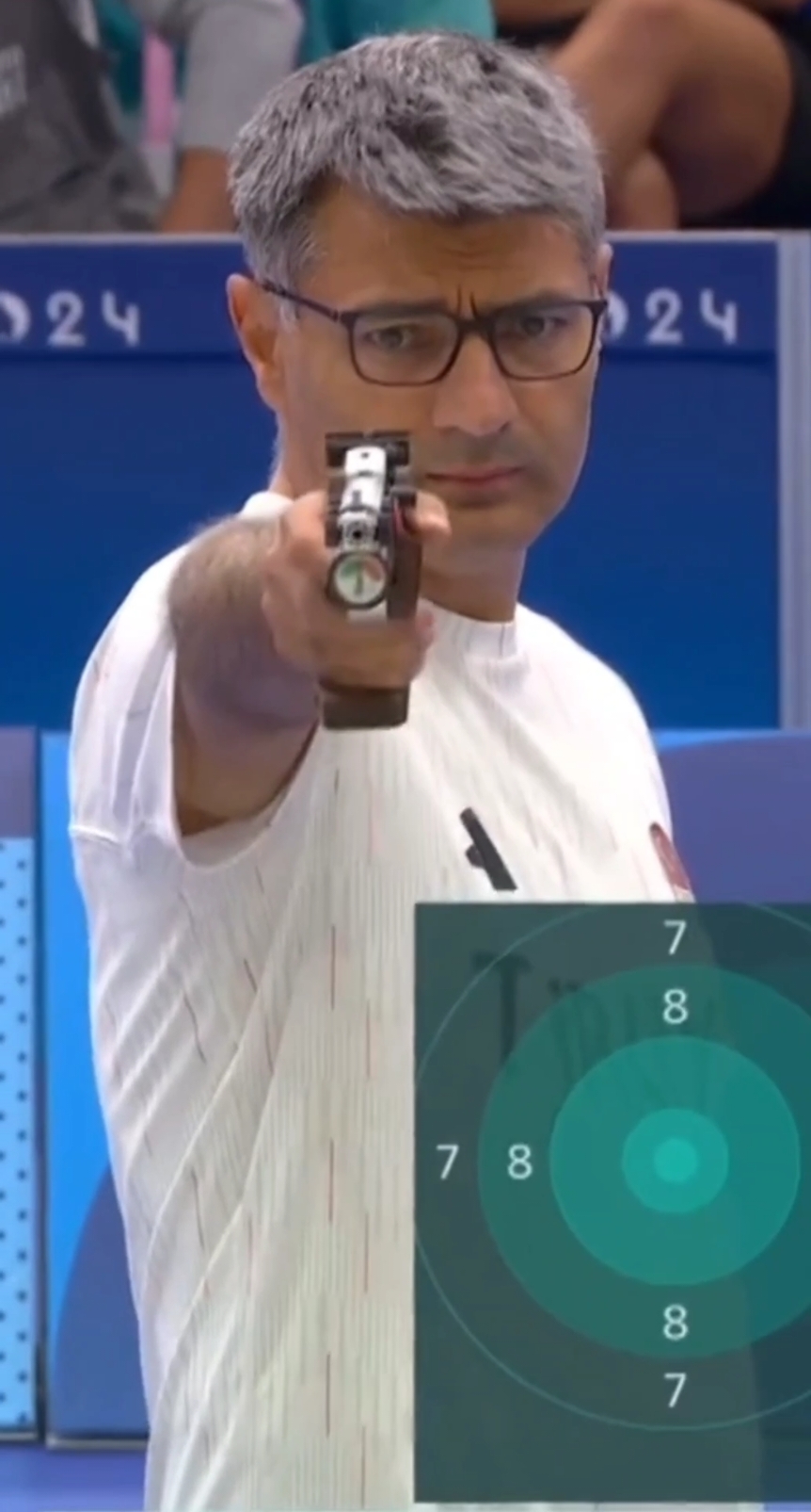 STRAIGHT OUT OF A MOVIE😎 Turkey's pistol shooter Yusuf Dikec caught public attention through his smooth shooting talent in the mixed 10-meter air pistol without having to use any special equipment. Dikec is a 51-year-old retired police officer who bagged silver at the Olympic Games Paris 2024.