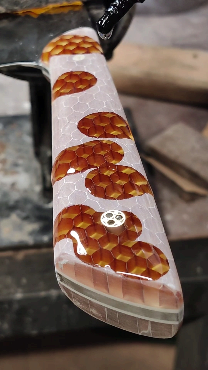 Oiling up another Bumblebee Chefs knife handle 🔪. This one is available in my webshop. Link in bio.#luxuryknives #kitchenware #satisfyingvideo #satisfying #asmrvideo #hexagons #honeycombasmr #dutchfoodie #honeycomb #makersoftiktok #knifemaking #craftsoftiktok 