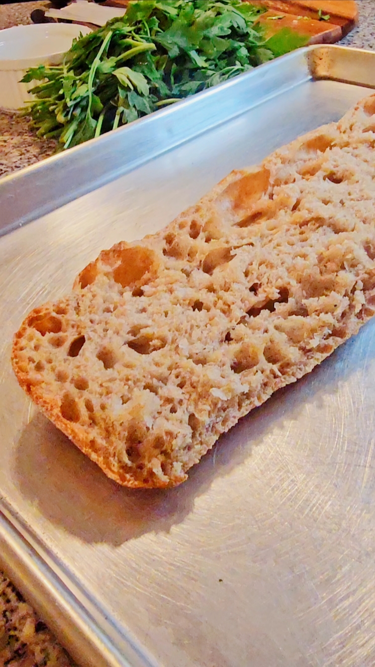 ✅️ Garlic Ciabatta Bread • 1/2 loaf of ciabatta bread (wheat ciabatta shown here) • 4 tbsp unsalted butter • 2 garlic cloves (minced) • 1/4 tsp sea salt • 1/2 cup fresh parsley • 3 tbsp freshly grated parm Mix until well blended. Place loaf in the oven at 400° for 12-15 minutes (varies based on your oven). Serve with your favorite pasta dish or add some pesto and mozzarella cheese for a scrumptious  snack. 👌🏾 #whiteplatediaries #castiron #madewithlove #simplicity #ciabattabread #garlicbread #cajun #creole #lovelanguage #safespace #bonappetit #musicislife #musicisahealer #musicistherapy #tiktokfood #instagood #foodstagram