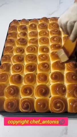 Delicious Crunchy Bread 🥰 recipe for homemade  preparation  24 pieces  in the mixer bowl  bread flour 400g instant yeast  7g sugar 40g egg 1 honey 30g water 180g knead the dough for 7min add butter 35g + salt 2g knead the dough for 3min rest the dough for 50min separate the dough  into 12 pieces  make balls rest the dough for 15min make the rolls  take a bowl sugar 30g  sesame seeds 40g  flour 30g stir well  pan size 28x28  brush the pan with oli  rest the dough for 60min brush with eggs Bake in a preheated oven 200C 23 to 25min  depend on the oven  brush  with  butter #food #foryou #Recipe #satisfying 