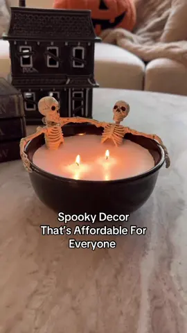 Skeleton Candle DIY 💀 I couldn’t believe how easy this was to make, and most of the supplies I found at Dollar Tree.  -black ceramic bowl -3 tall candles -mini skeletons (came on a string but easily detachable with a pair of scissors.) Place the candles in a large pot filled with water and bring to a simmer. Allow the wax to melt completely. Remove the wicks from the candles, then place into the middle of the bowl. Secure the wicks between two skewers to hold them in place. Pour the melted wax from each candle into the bowl, then position the skeletons as well. Allow the wax to harden, then cut the wicks before lighting. #halloweendecor #halloweencountdown #halloweenvibes #halloweenaesthetic #halloweendiy #spookyseason #skeletoncandle #autumnmood