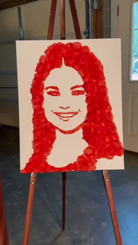 I made @Selena Gomez out of rose pedals 🌹 who should I do next?  #selenagomez #art #rose #flowers #portrait #talent #foryoupage 