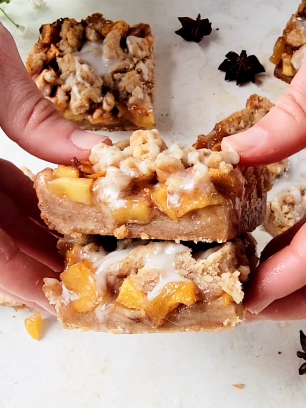 These Peach Cobbler Bars combine ripe, juicy peaches with a delicious buttery, crumble that serves as both the crust and the crumb topping. Every bite is bursting with juicy peaches complemented by the crunch of the crumble topping. Top these with a vanilla icing and a scoop of vanilla ice cream for the perfect finishing touch. Find the full, printable recipe for these Peach Cobbler Bars on my blog at simplebakingwithpep.com.   https://simplebakingwithpep.com/peach-cobbler-bars/ Here's a quick tip: For these peach cobbler bars, the peaches do not need any cooking prior to adding on top of the crust. Simply toss the peaches in a cinnamon sugar, then add on top of the crust. The cinnamon sugar helps the peaches to release their natural juices, which makes an absolutely delicious syrupy, juicy peach mixture once the bars are baked. #peaches #Peach #peachcobbler #peachcobblerbars #peachcrumblebars #Summer #dessert #baking #summerrecipe #imsomartha #foodnetwork #nytcooking #food52 #EasyRecipe #Foodie #mywilliamssonoma #thekitchn #huffpostfood 