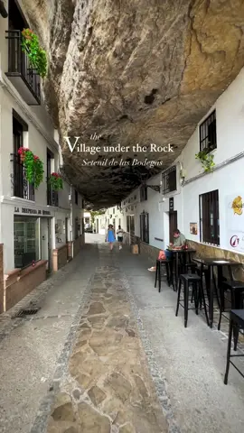 Setenil de las Bodegas - you don't see this every day. With shops and houses built into the rock above the Río Guadalporcún, it's worth taking the journey to this gorgeous, ancient town 🇪🇸    Thanks to @butnomatter.theroadislife for the vid!     Register with Trip.com and download the app now for our best travel deals, plus earn Trip Coins that'll save you money on future bookings.  Check out the link in bio for more 👉 Ts & Cs apply!  #SetenildelasBodegas #Spain #Andalusia #TravelDeals #TravelApp #TravelEasy #Travel #TravelInspiration #TripDotCom #traveltiktok #holiday #viral #trending #travel #vacationmode #fyp 