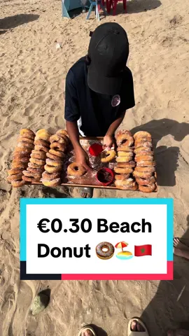 €0.30 Beach Donut 🍩🏖️🇲🇦 #morocco #beach #donut 