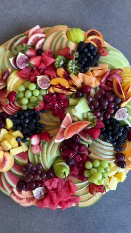 Our Fruit Board is made with 20 fresh fruits and a whole lotta love ❤️#charcuterie #charcuterieboard #charcuterieboardsoftiktok #grazingboard #grazingtable #femaleowned #SmallBusiness #smallbiz #makingof #fruit #freshfruit #summerfruit #fruitboard #fruitsbasket #fruits 