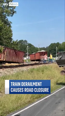 Roads in central North Carolina were closed after a train derailed and fell off the tracks. The closures remained in place until the train was safely put back onto the tracks. No injuries were reported during the incident. #NorthCarolina #Train #Derailed #US #Footage