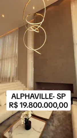 ALPHAVILLE- SÃO PAULO  Localizada no Tamboré 3, um dos condomínios mais luxuosos e cobiçados de Alphaville, a casa é uma verdadeira obra-prima de requinte e elegância.  O living, com pé direito duplo e lareira a gás, cria um ambiente acolhedor e iluminado naturalmente. A área social é ideal para receber com elegância e estilo. A área gourmet, integrada ao living, conta com piscina de borda infinita, jardim vertical e home cinema, oferecendo um espaço perfeito para lazer.  O paisagismo com irrigação automática e o sistema de som independente elevam o conforto ao máximo. No pavimento superior, quatro suítes proporcionam total privacidade, com destaque para a master, que inclui closet para o casal.Mobiliários de alto padrão e decoração exclusiva completam este refúgio de luxo e conforto. Mansão triplex com projeto contemporâneo disponível para venda | Terreno: 1.000 m2 | AC:1.256 m2|  6 suítes | 16 vagas. VALOR DE VENDA : R$ 19.800.000,00 Agendamentos: (11) 91696-1011 © 2024 copyright todos os direitos reservados para Augusto Braga. Fica proibida qualquer reprodução dos vídeos e fotos sem prévia autorização. #realestate #luxuryrealestate #imoveisdeluxo #mansao 