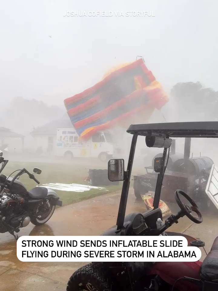 Residents in parts of northern Alabama were forced to take shelter on Saturday due to severe thunderstorms in the area.   Footage captured and posted to Facebook by Joshua Cofield shows strong winds lifting an inflatable slide into the air during a gathering in Hillsboro on Saturday afternoon.   Cofield noted on the Facebook post that parents had removed the children from the slide just “two minutes” before it went airborne. #news #weather